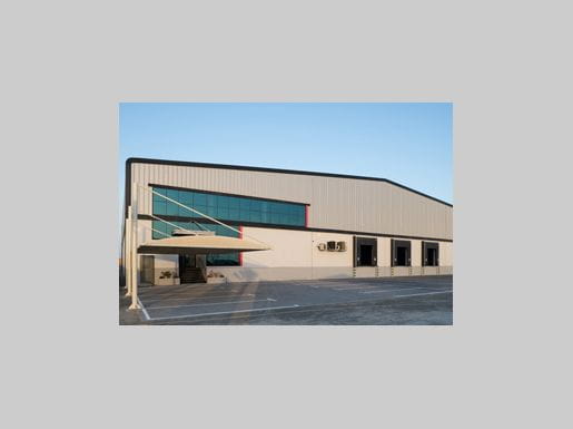 Kizad awards AED 100 Million Pre-Built Warehousing contract to System Construct
